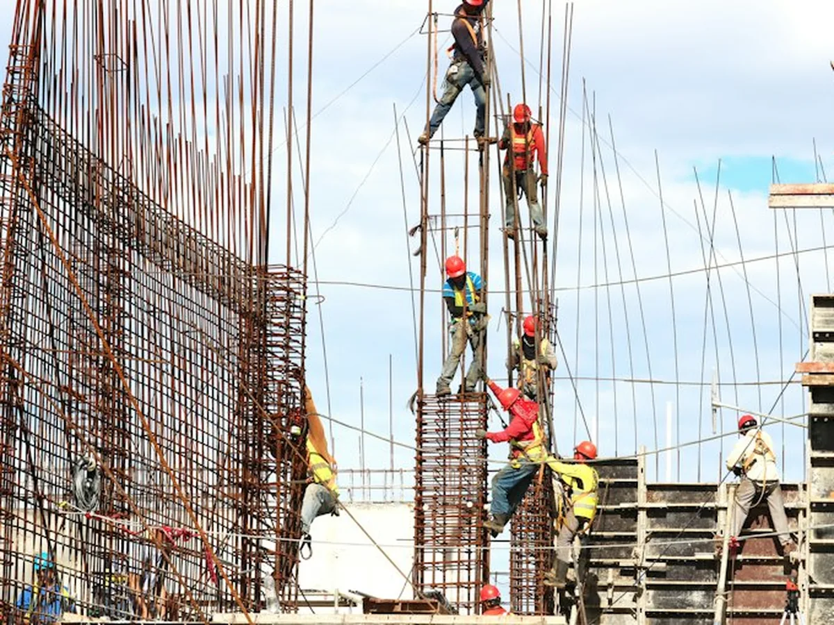 Facade installers working on a high-rise project